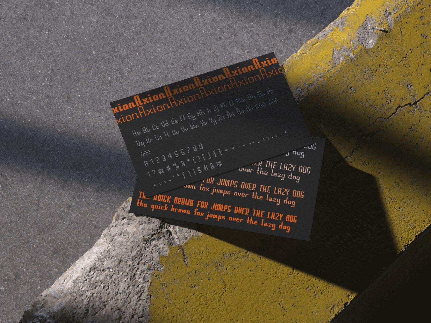 Glyphs-Mockup on a Business-Card of the Typeface Axion by Jan Zeller
